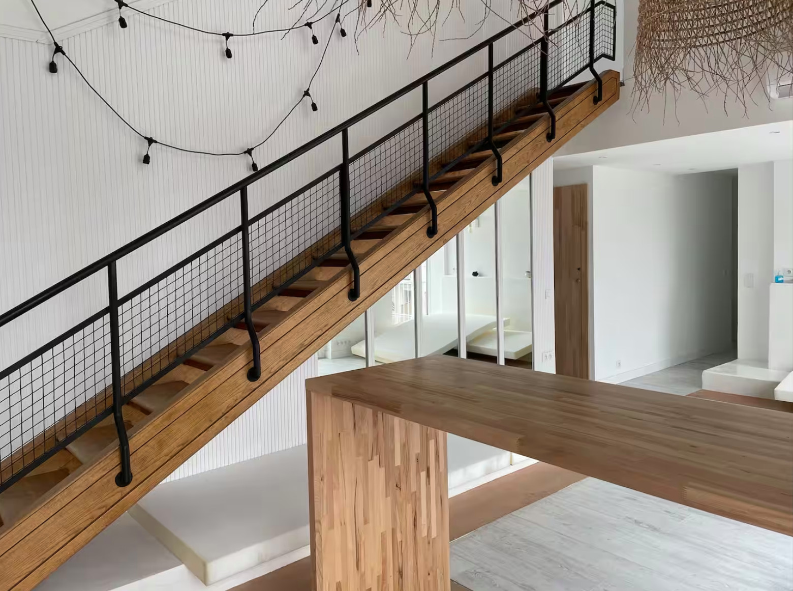 Projet Nédélec, rénovation d'un appartement avec mezzanine rooftop et balcon.