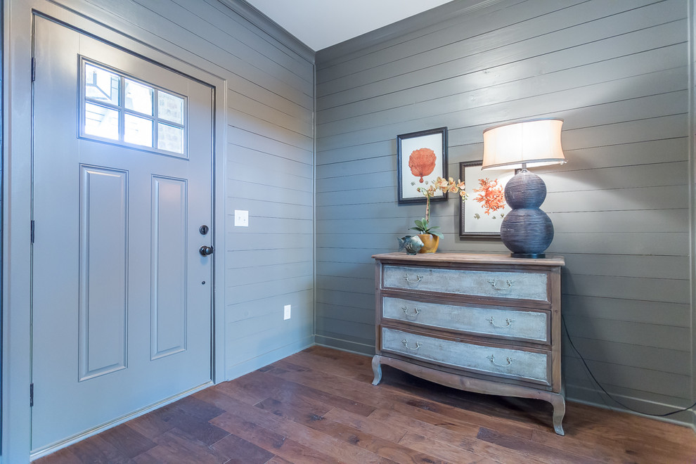 Inspiration for a mid-sized country foyer in Birmingham with grey walls, dark hardwood floors, a single front door and a gray front door.