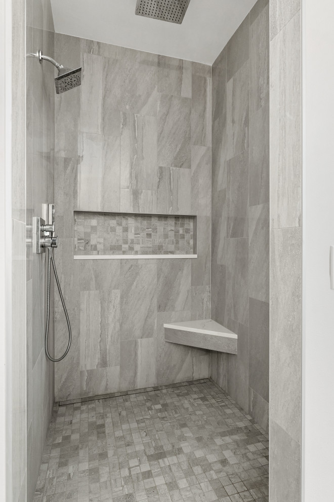 Design ideas for a large traditional ensuite bathroom in Seattle with beaded cabinets, black cabinets, a freestanding bath, an alcove shower, a one-piece toilet, white tiles, white walls, marble flooring, a built-in sink, engineered stone worktops, white floors, an open shower, white worktops, a shower bench, double sinks and a built in vanity unit.