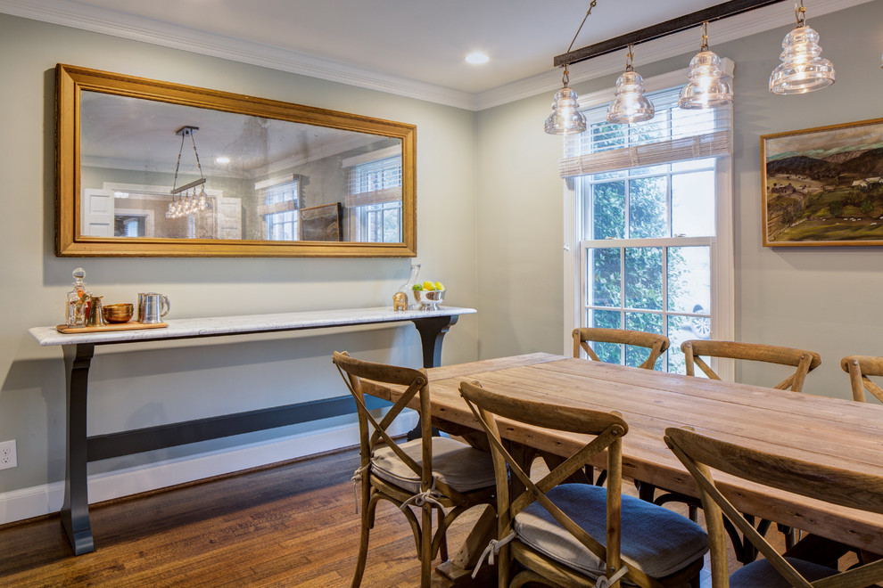 Dining room - transitional dark wood floor dining room idea