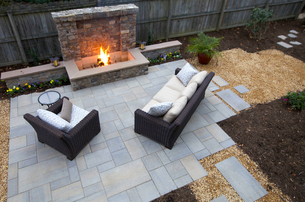 Inspiration for a mid-sized arts and crafts backyard patio in Richmond with a fire feature, concrete pavers and no cover.