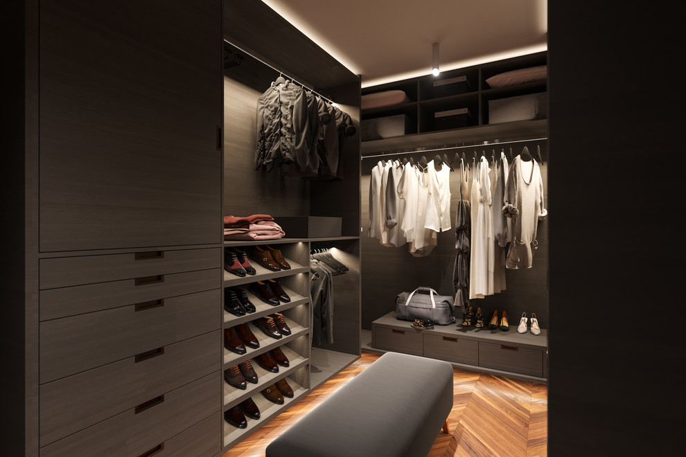 Design ideas for a mid-sized modern gender-neutral walk-in wardrobe in Melbourne with open cabinets, dark wood cabinets and dark hardwood floors.