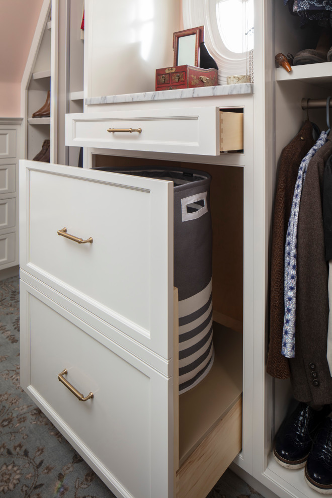 Photo of a large traditional gender-neutral walk-in wardrobe in Seattle with recessed-panel cabinets, white cabinets, carpet and multi-coloured floor.