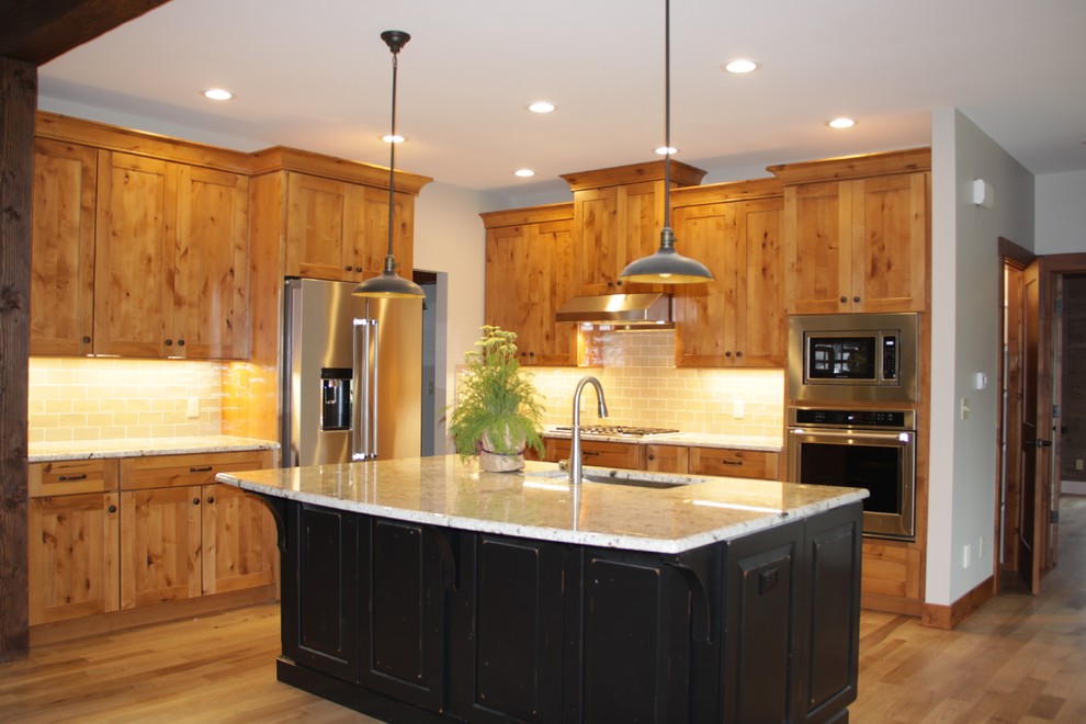 Kitchen - rustic kitchen idea in Grand Rapids