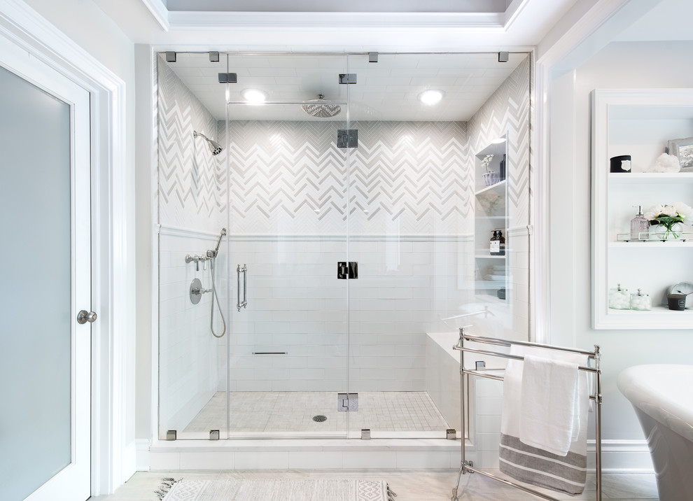 Photo of a mid-sized transitional master bathroom in New York with beaded inset cabinets, green cabinets, a freestanding tub, an alcove shower, white tile, subway tile, grey walls, an integrated sink, quartzite benchtops, a hinged shower door and white benchtops.