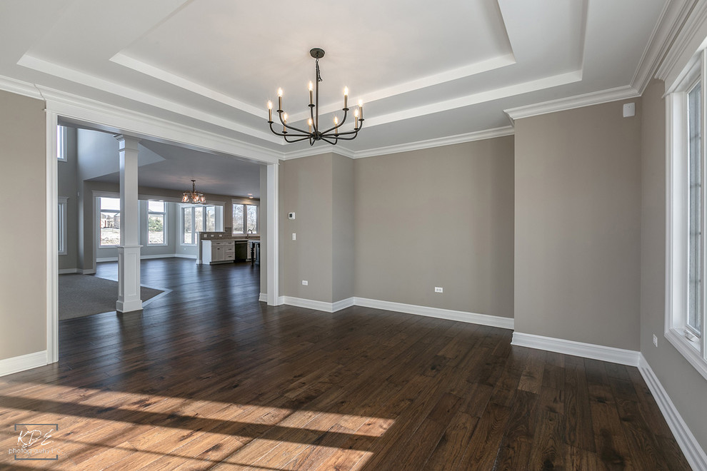 This is an example of a large transitional dining room in Chicago.
