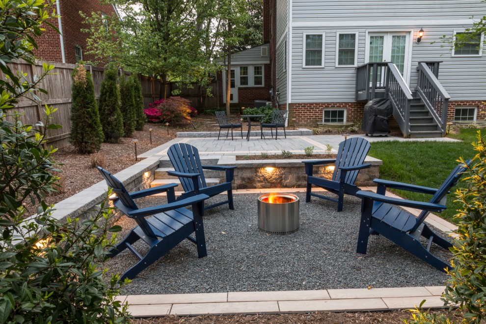 This is an example of a contemporary garden in DC Metro with a fire feature.