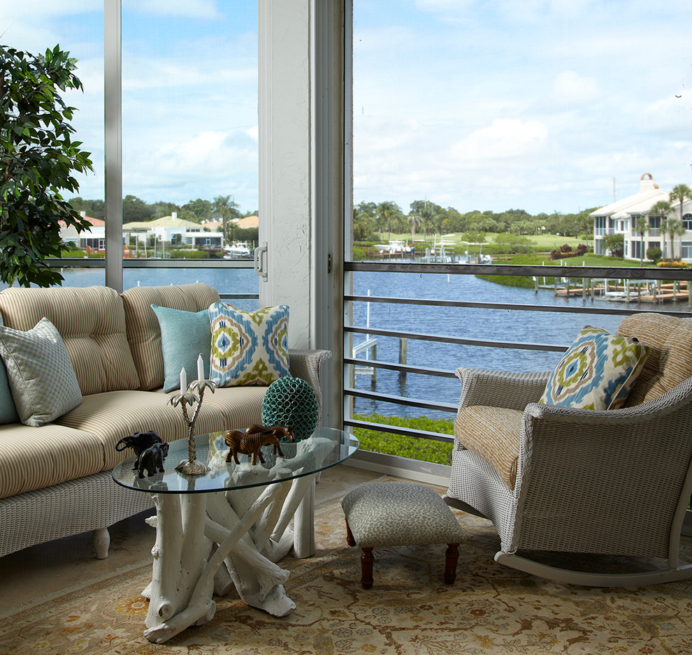 This is an example of a transitional sunroom in Miami.