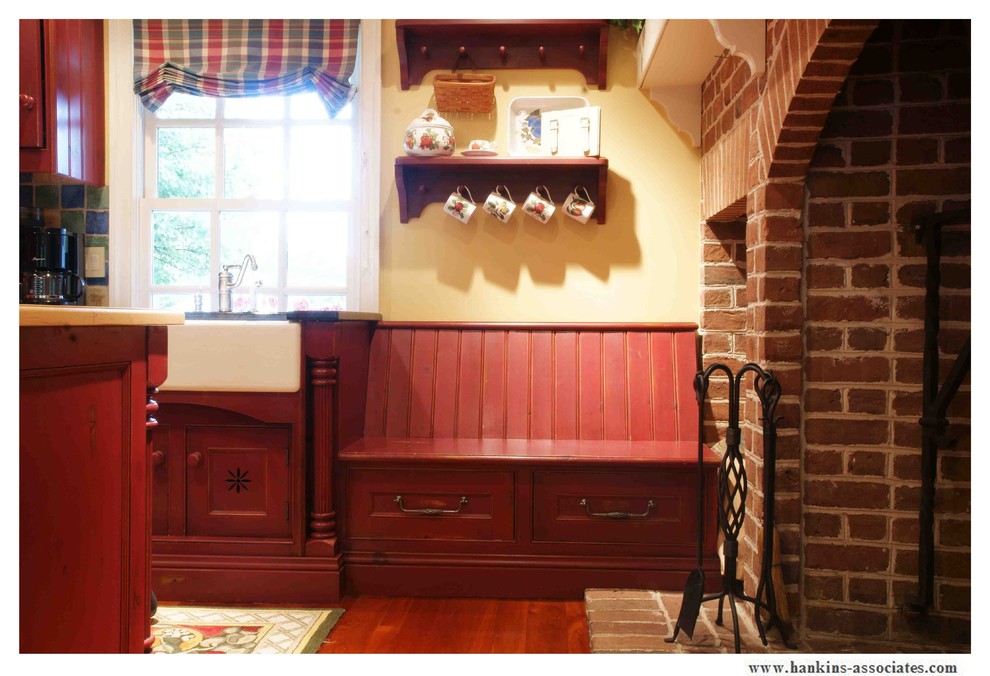 Inspiration for a large farmhouse galley medium tone wood floor and multicolored floor eat-in kitchen remodel in Philadelphia with a farmhouse sink, beaded inset cabinets, distressed cabinets, granite countertops, wood backsplash, stainless steel appliances and two islands