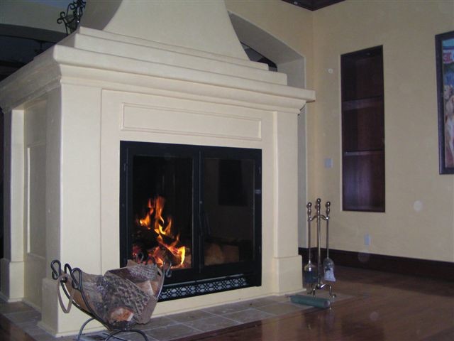 Photo of a large traditional family room in Minneapolis with a standard fireplace and a stone fireplace surround.