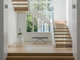 Modern Staircase by The Lagasse Group, LLC