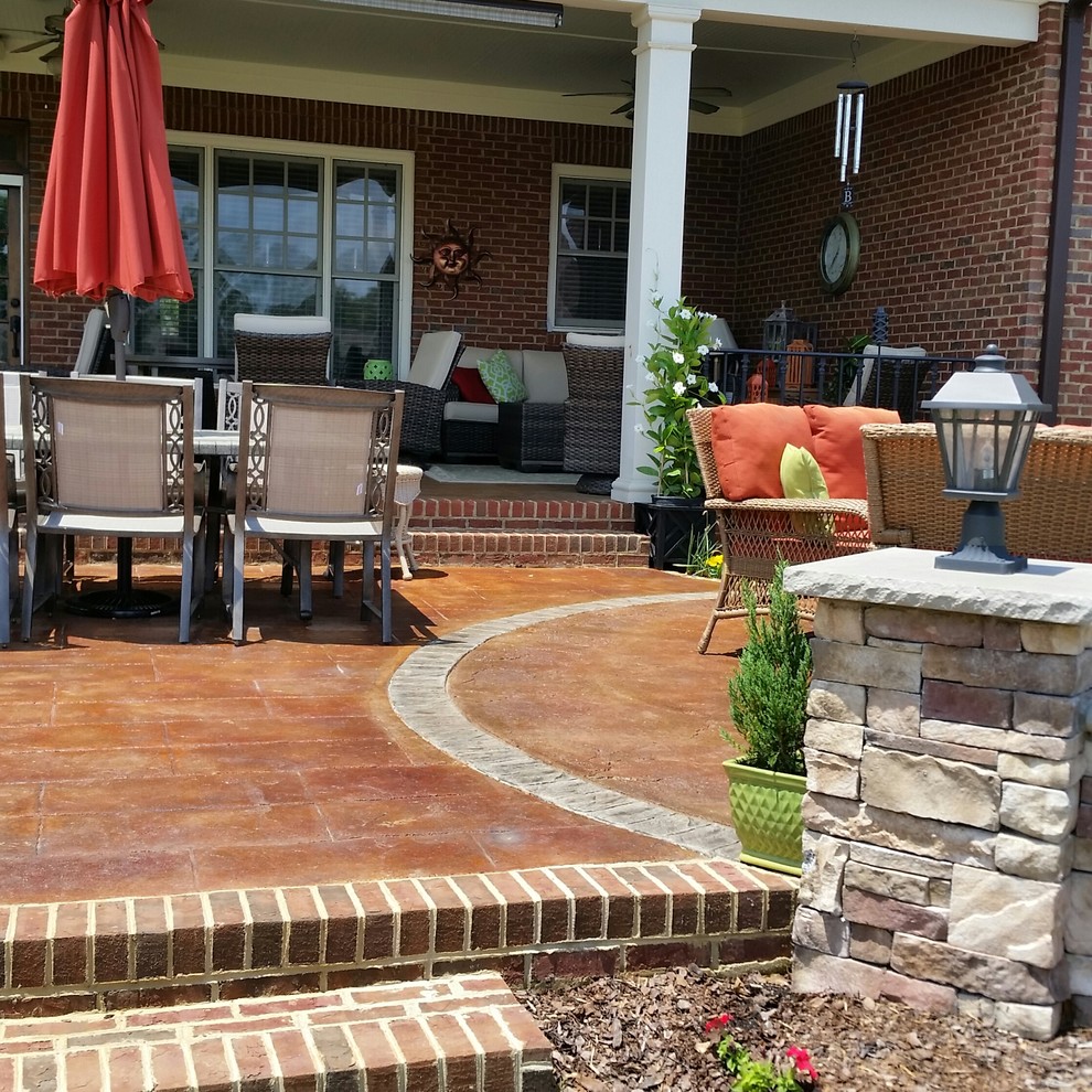 Mid-sized traditional side yard patio in Other with a fire feature and no cover.