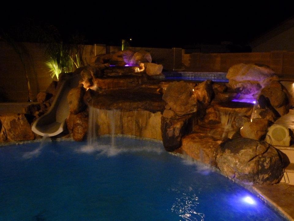 Mid-sized backyard custom-shaped lap water slide photo in Phoenix