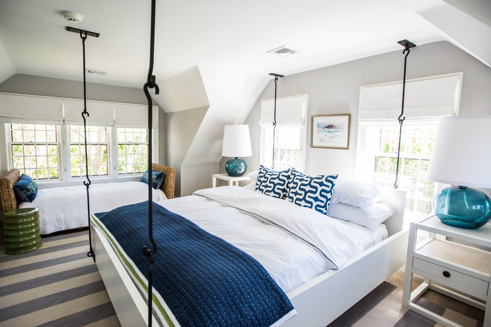 Beach style bedroom photo in Boston with gray walls