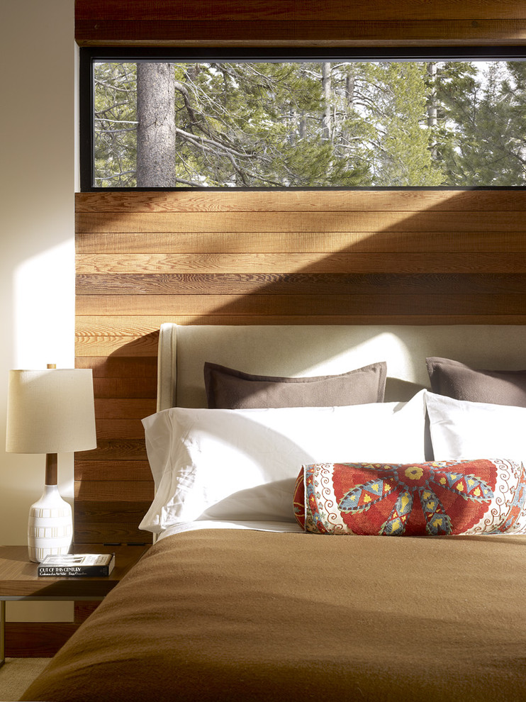Inspiration for a country bedroom in Sacramento with brown walls.