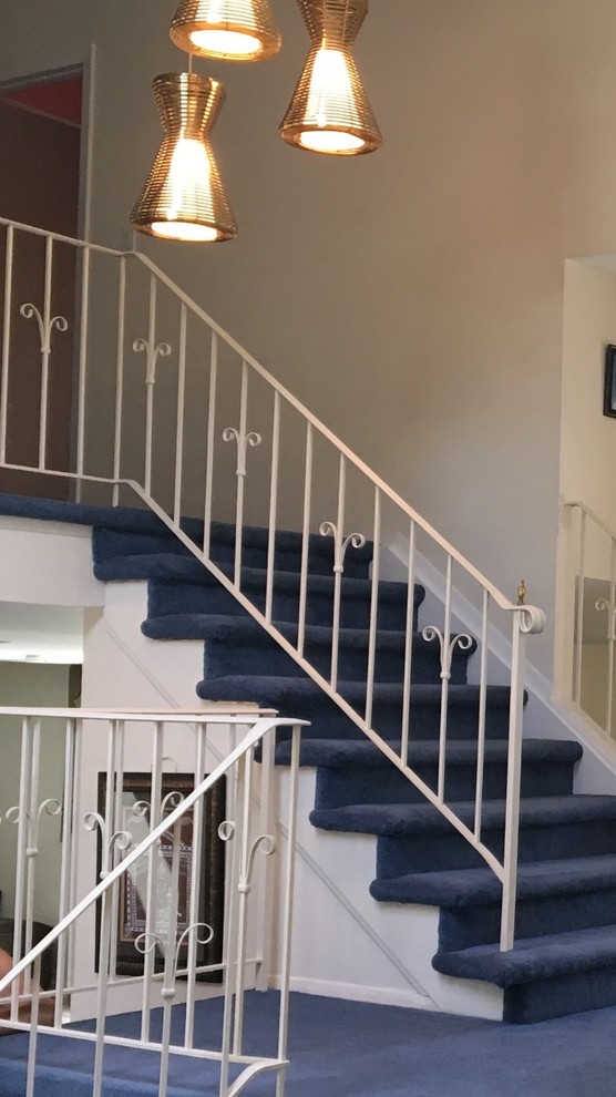 Suggestions to update wrought iron stair railing without replacing?