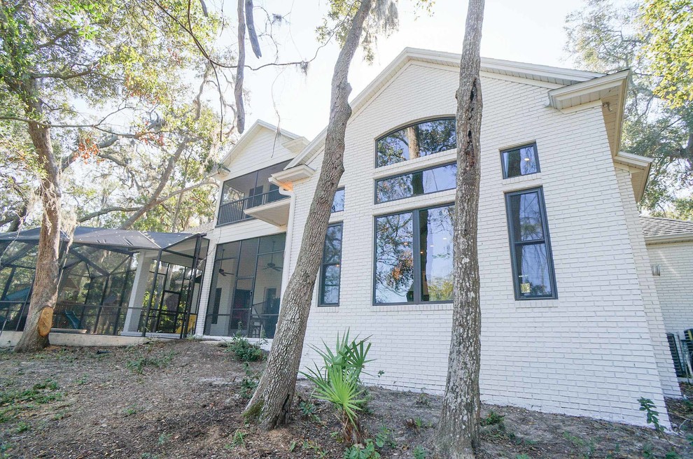Example of a transitional home design design in Jacksonville