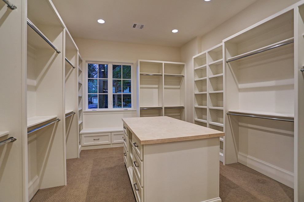 Design ideas for a transitional storage and wardrobe in Houston.