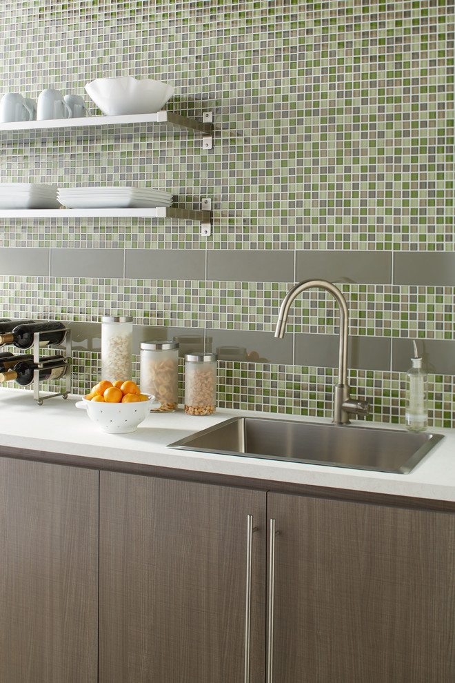 Inspiration for a contemporary single-wall eat-in kitchen remodel with glass tile backsplash