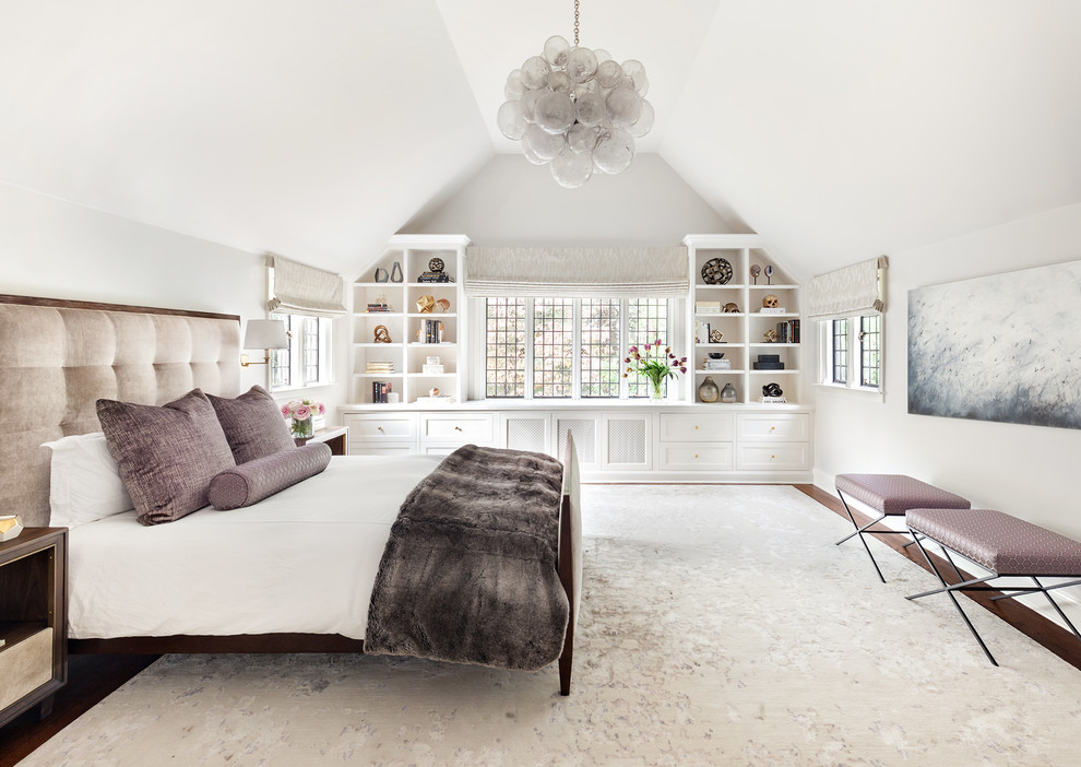 Inspiration for a transitional master bedroom in New York with white walls.