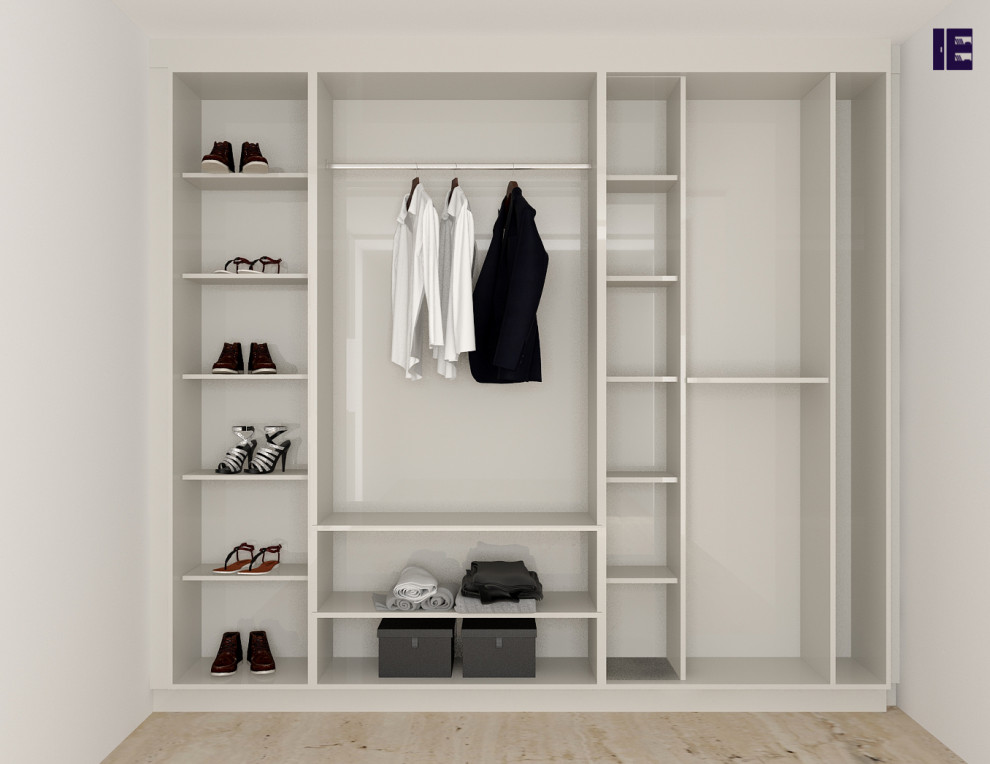 Inspiration for a medium sized contemporary standard wardrobe in London with flat-panel cabinets and white cabinets.