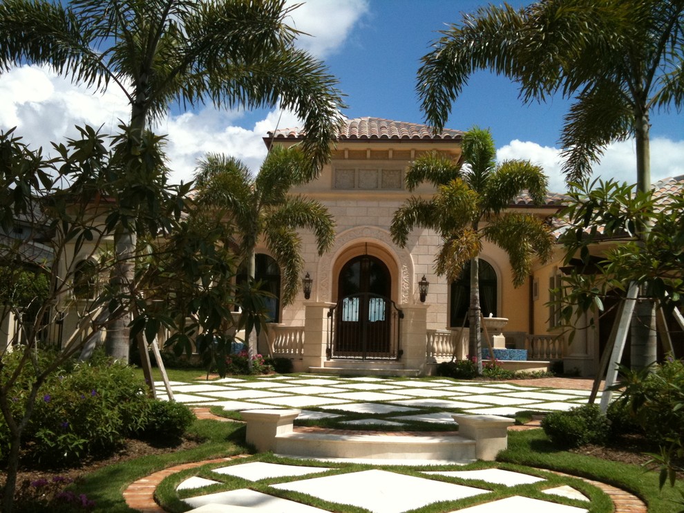 This is an example of a mediterranean one-storey exterior in Miami.