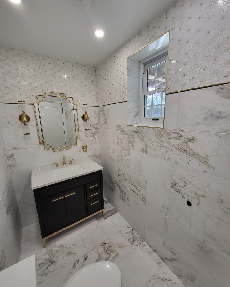 Example of a mid-sized classic home design design in New York