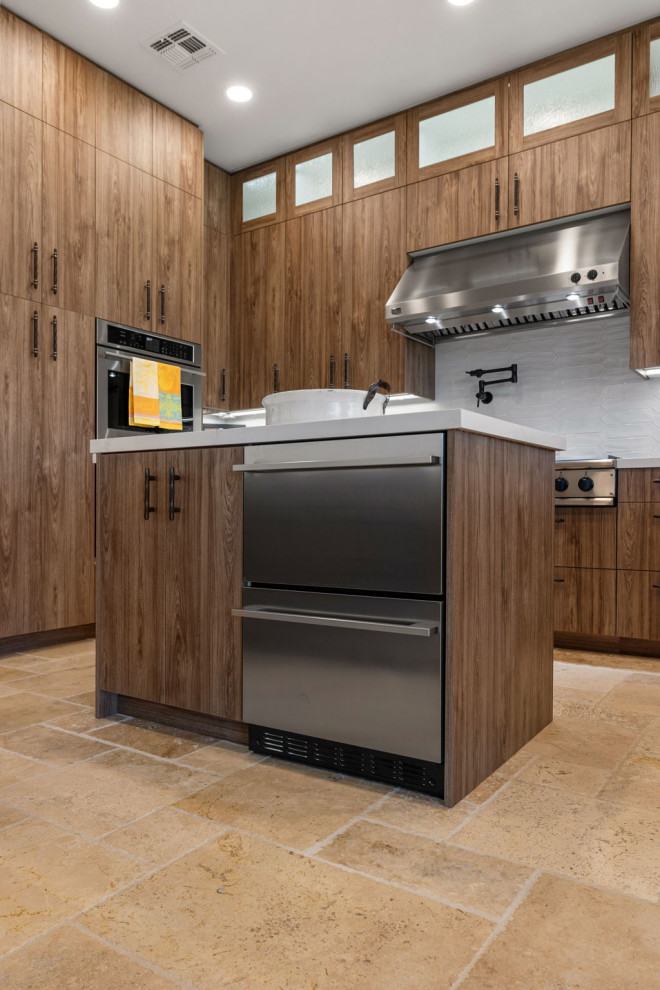 Mountain style l-shaped slate floor and beige floor enclosed kitchen photo with a single-bowl sink, flat-panel cabinets, medium tone wood cabinets, quartzite countertops, white backsplash, glass sheet backsplash, stainless steel appliances, a peninsula and white countertops
