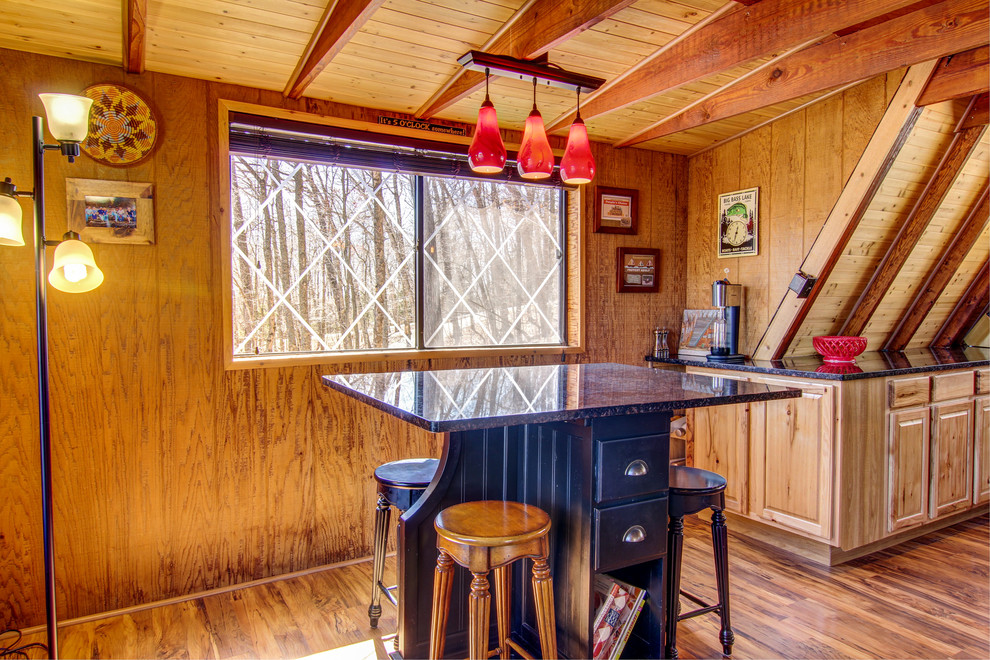 Example of a mountain style home design design in St Louis