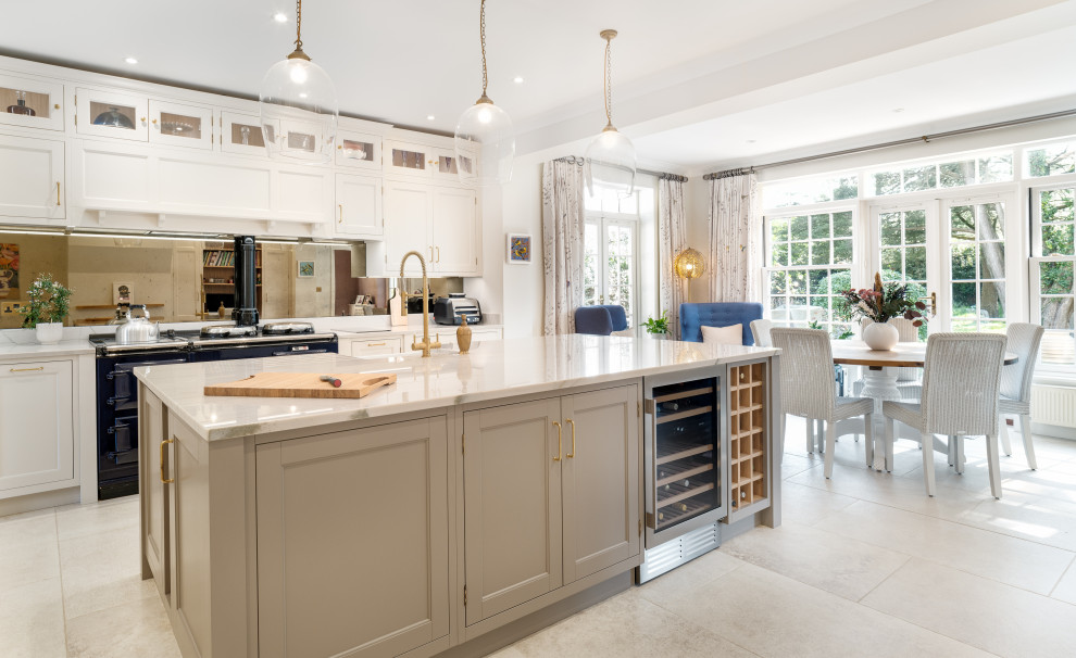Design ideas for a large traditional kitchen in Surrey with shaker cabinets, white cabinets, granite benchtops, mirror splashback, with island and white benchtop.