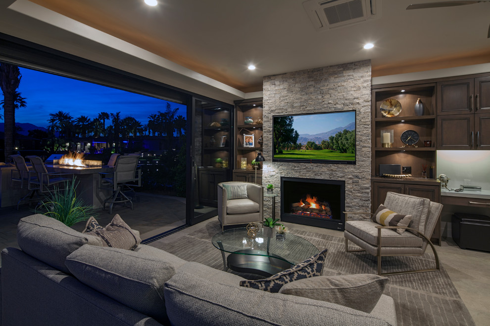 Small contemporary open concept living room in Other with a standard fireplace, a stone fireplace surround, a built-in media wall and beige floor.