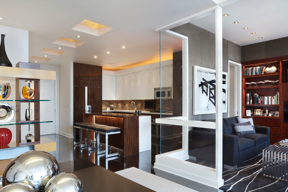 Design ideas for a mid-sized contemporary l-shaped open plan kitchen in New York with flat-panel cabinets, dark wood cabinets, stainless steel appliances, a peninsula, an undermount sink, quartz benchtops, brown splashback, stone slab splashback, porcelain floors and black floor.