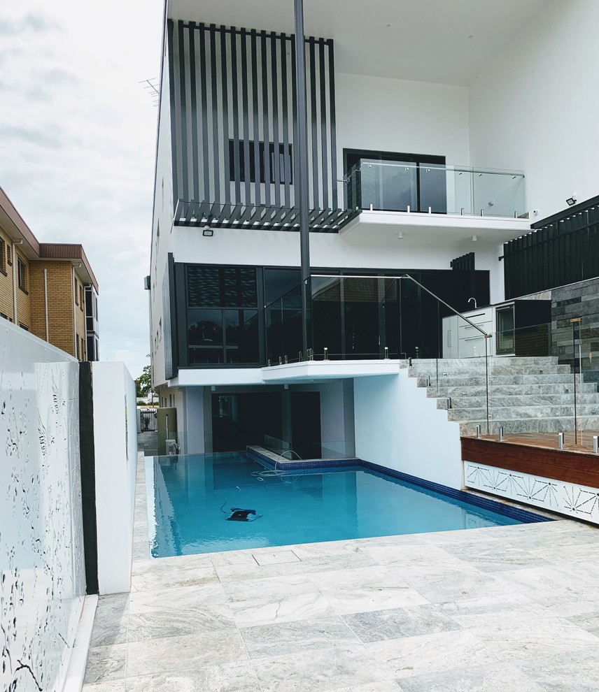 Large contemporary pool in Brisbane.