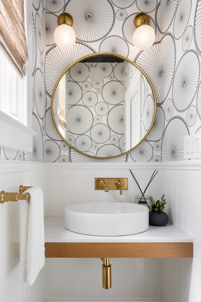 Photo of a small classic cloakroom in San Francisco with panelled walls, wallpapered walls, multi-coloured walls, a vessel sink, white worktops, a built in vanity unit and a dado rail.
