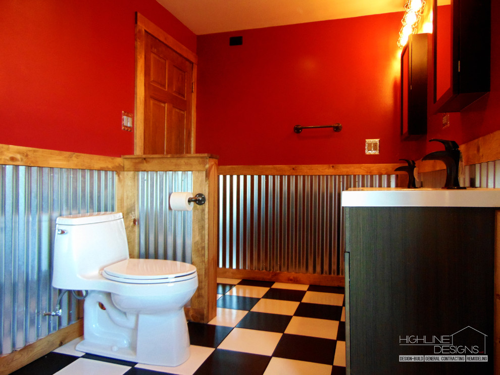Inspiration for a mid-sized country 3/4 bathroom in Milwaukee with shaker cabinets, dark wood cabinets, an open shower, a two-piece toilet, black and white tile, ceramic tile, red walls, ceramic floors and marble benchtops.