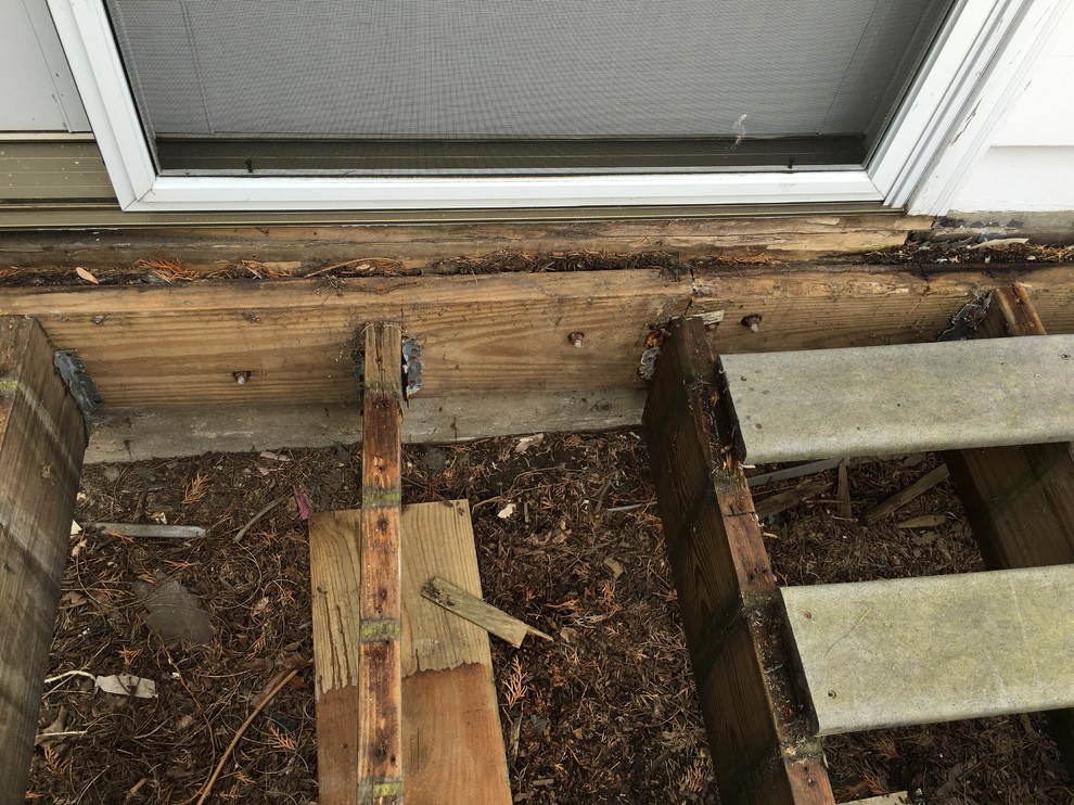 REPLACING JOIST SUPPORTS ON DECK.