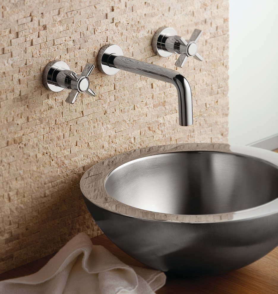 Bathroom - contemporary beige tile and stone tile bathroom idea in Orange County with wood countertops