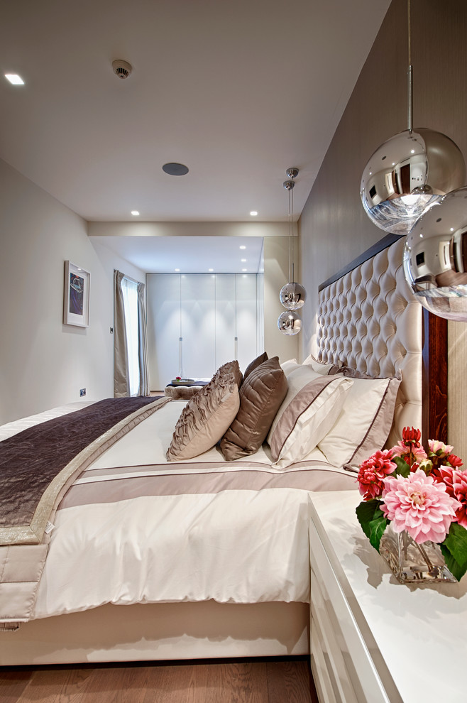 Design ideas for a mid-sized contemporary bedroom in Surrey.