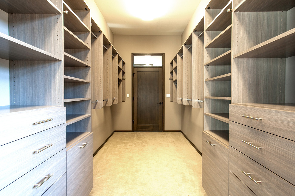 Photo of a contemporary storage and wardrobe in Portland.