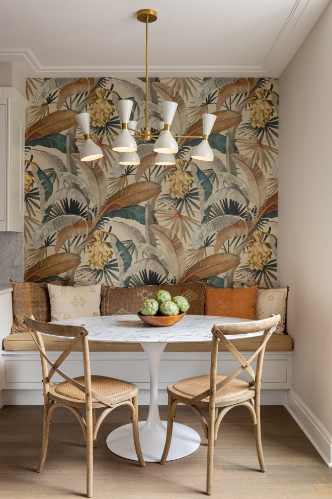 Inspiration for a mid-sized tropical dining room in New York.