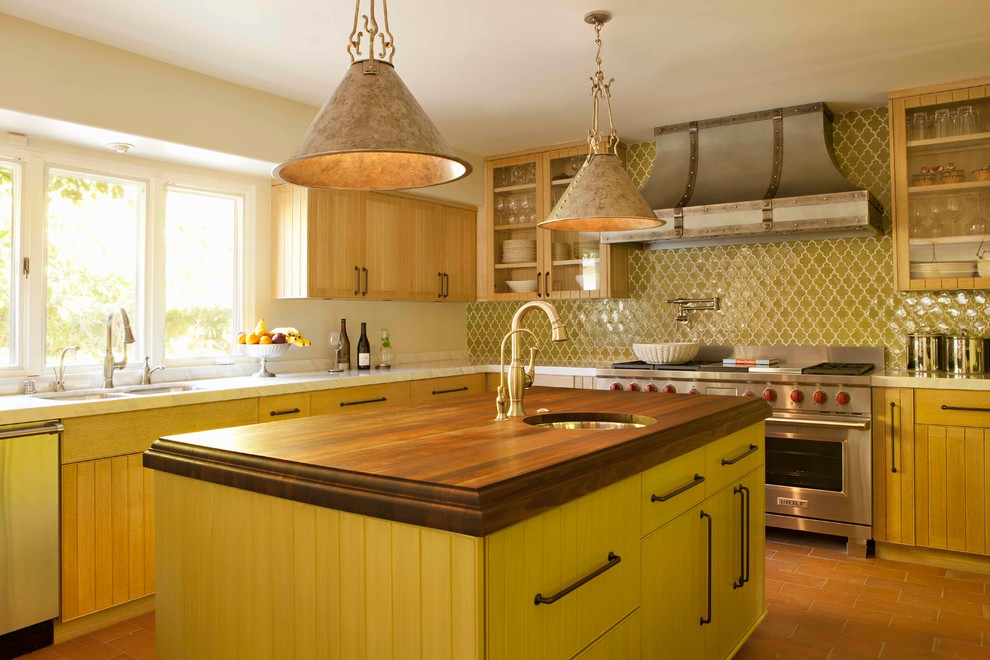 Photo of a traditional kitchen in Los Angeles with green splashback.