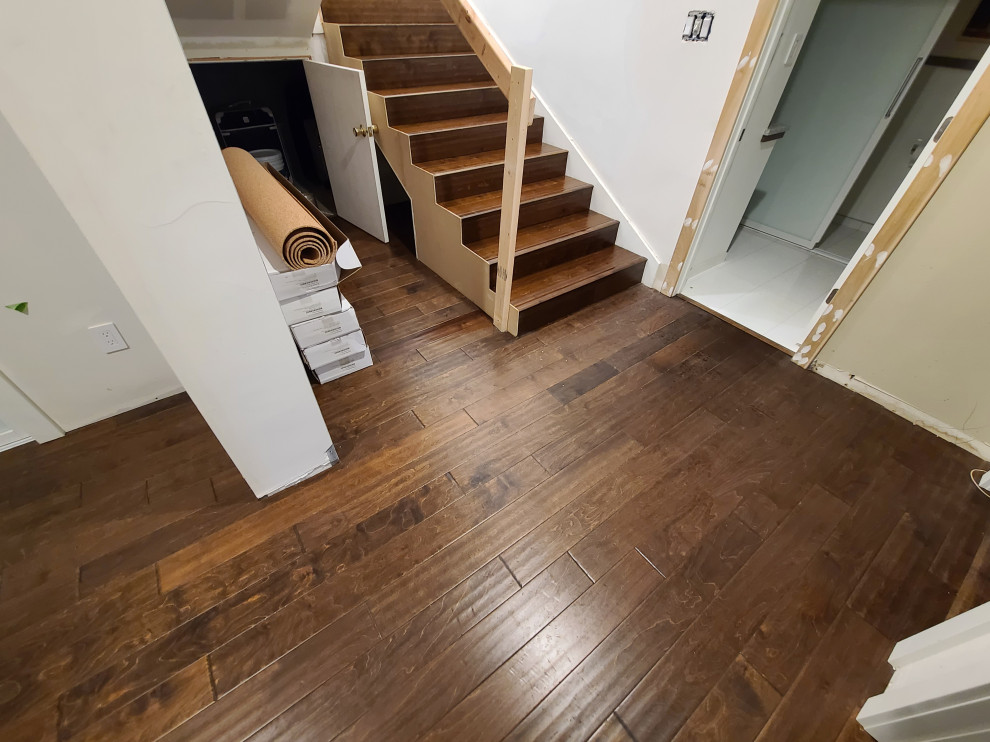 Sleek Engineered Hardwood & Modern Sliding Door by I’m The Man Services