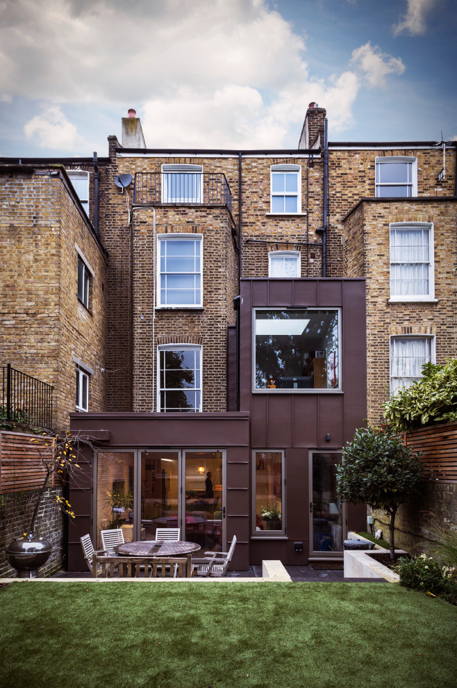 Example of a trendy exterior home design in London