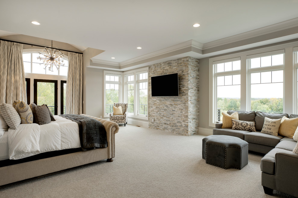 Large traditional master bedroom in Minneapolis with grey walls, carpet and white floor.