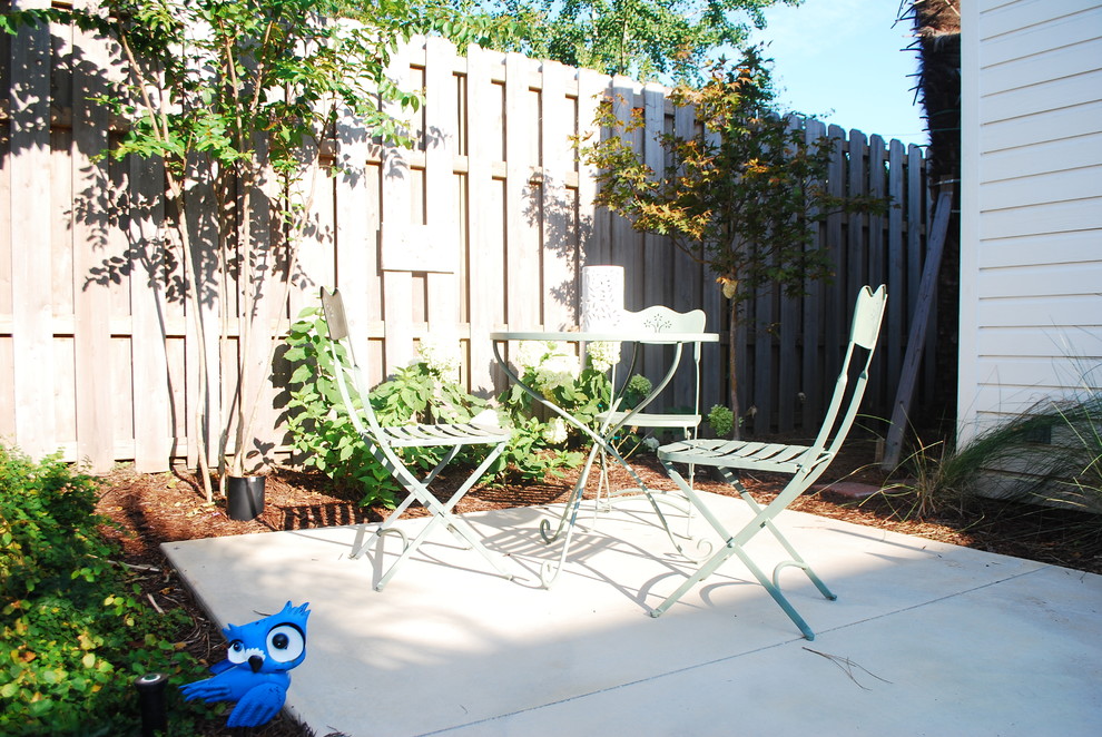 Example of a small transitional home design design in Miami