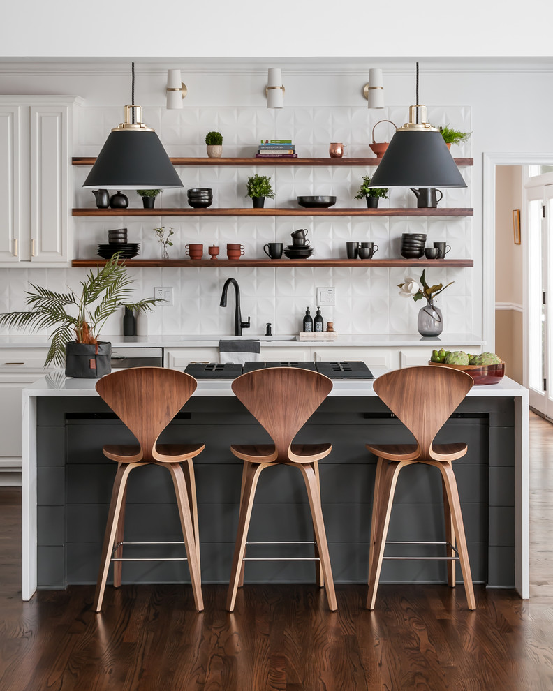 Inspiration for a mid-sized modern galley kitchen in Atlanta with a drop-in sink, open cabinets, dark wood cabinets, quartzite benchtops, white splashback, stainless steel appliances, dark hardwood floors, with island, brown floor, white benchtop and ceramic splashback.