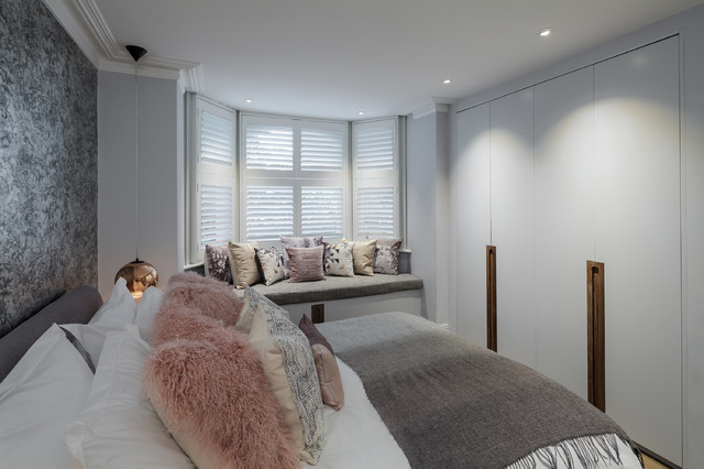 Cosy & Contemporary Basement Apartment in Belsize Park eclectic-bedroom