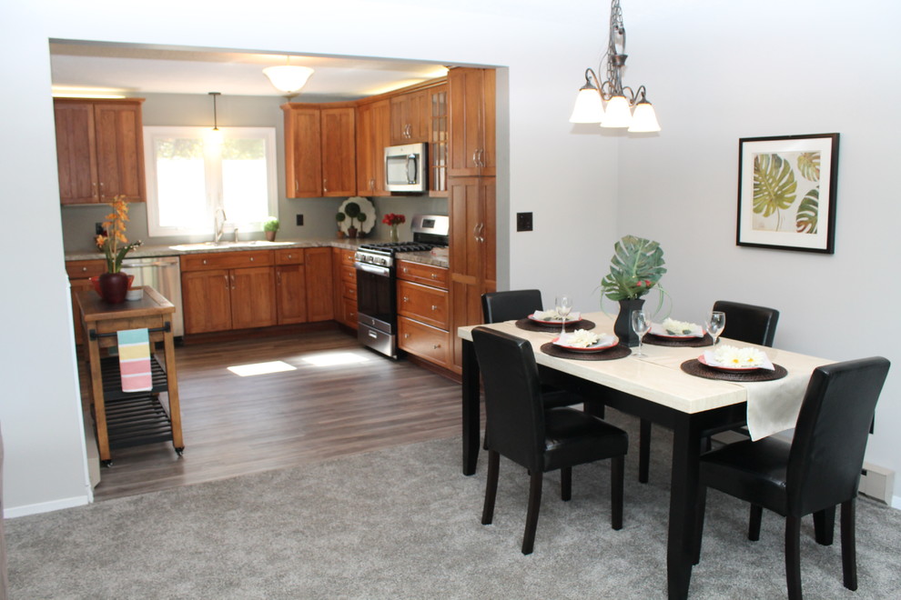 Example of a transitional carpeted and gray floor great room design in New York with gray walls