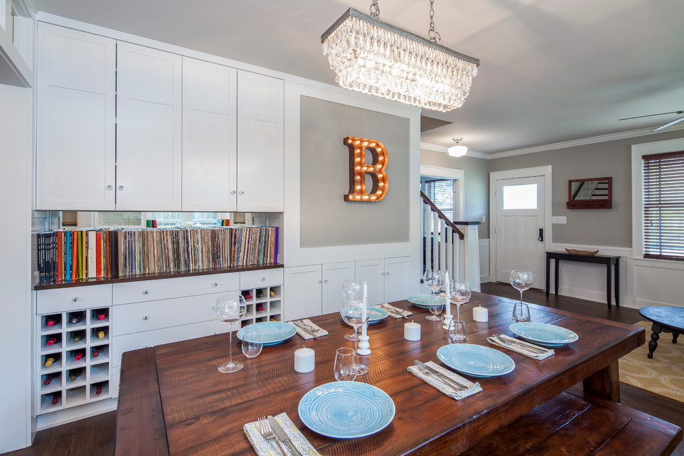 Example of a mid-sized transitional dark wood floor kitchen/dining room combo design in Austin with gray walls