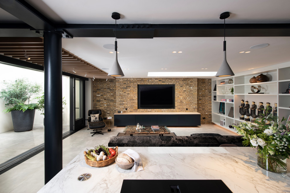 Example of a mid-sized trendy l-shaped concrete floor, gray floor and wood ceiling open concept kitchen design in London with an integrated sink, dark wood cabinets, marble countertops, white backsplash, marble backsplash, black appliances, an island and white countertops